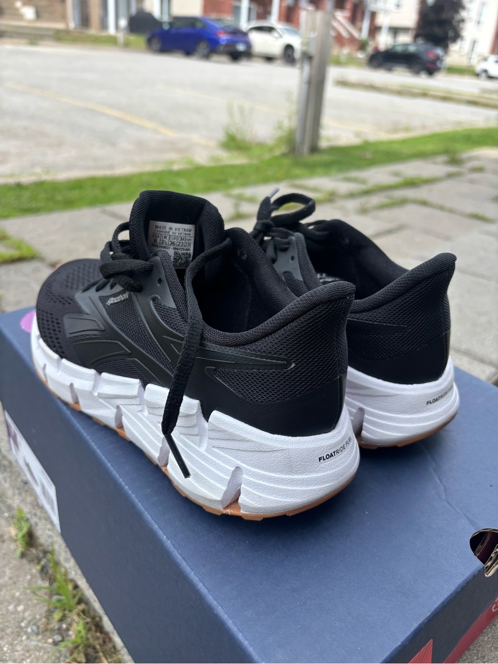 Reebok Men’s Black and White Athletic Running Shoes